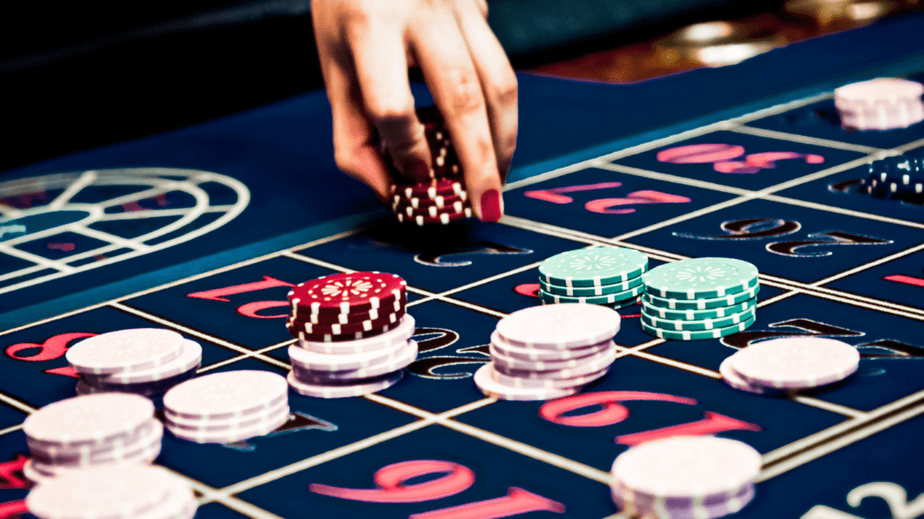 a person playing roulette on a casino table