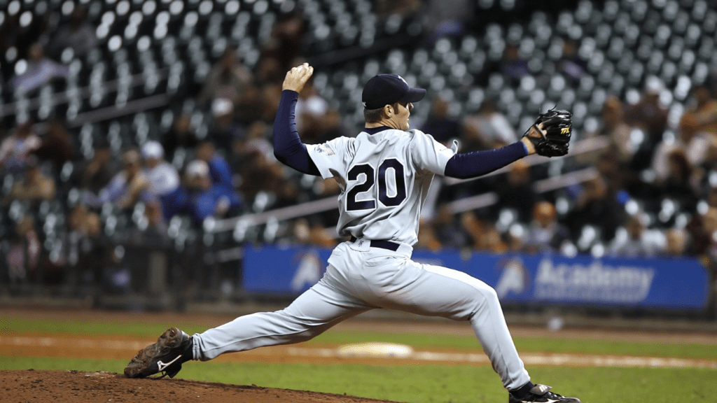 a baseball pitcher throwing the ball during a game